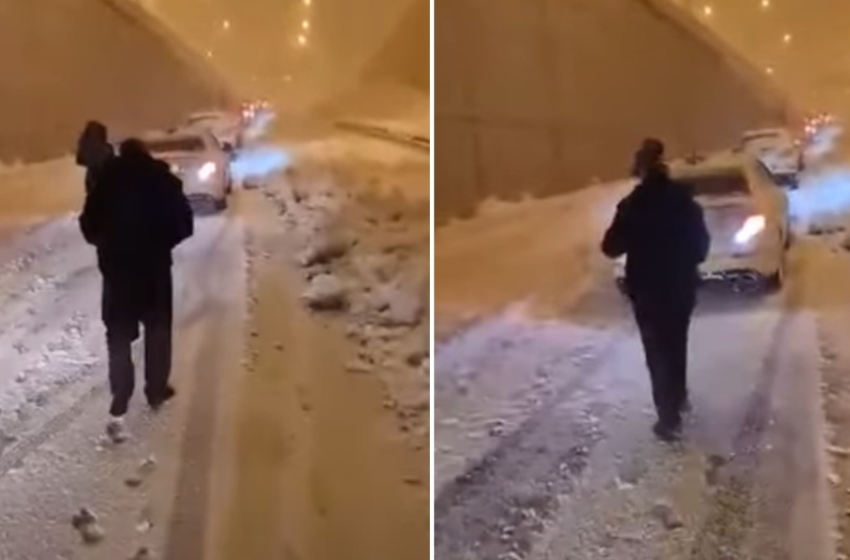  I bllokuar në mes të dëborës, babai merr në krahë fëmijën e udhëton 2.5 km në stuhi